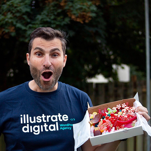 Manuel Docampo Rodriguez receiving some sweet treats, wearing an Illustrate Digital t-shirt